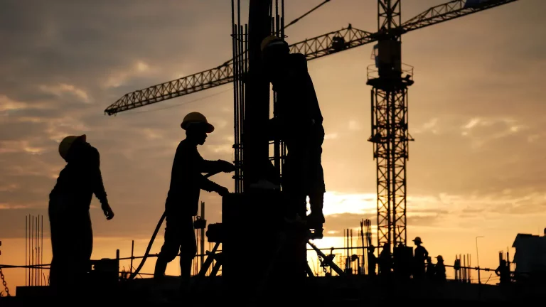 What are the main challenges in industrial construction estimating?